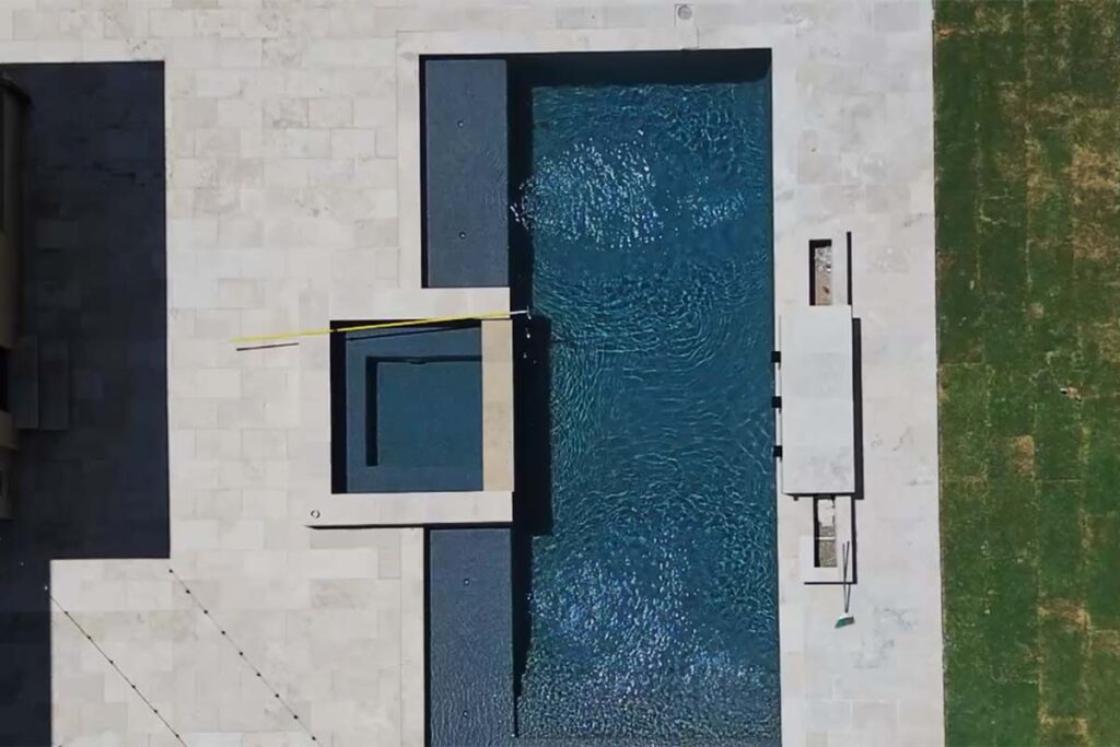 Aerial view of concrete pool, Modern Raleigh.
